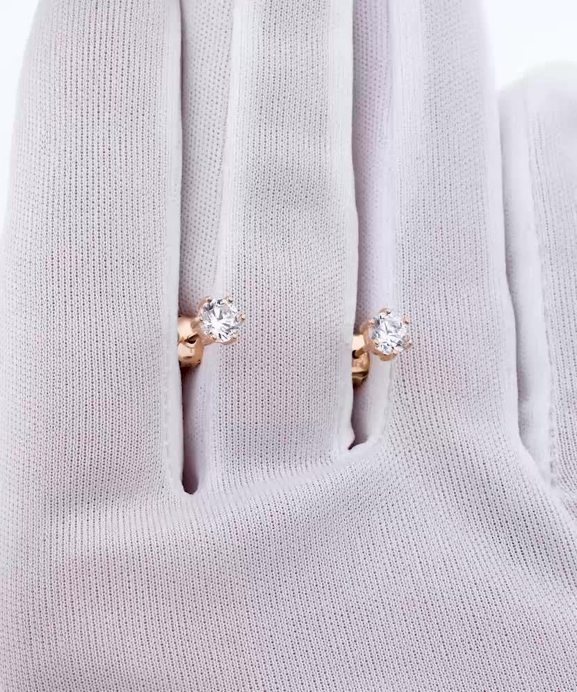 Gold earrings with zircons