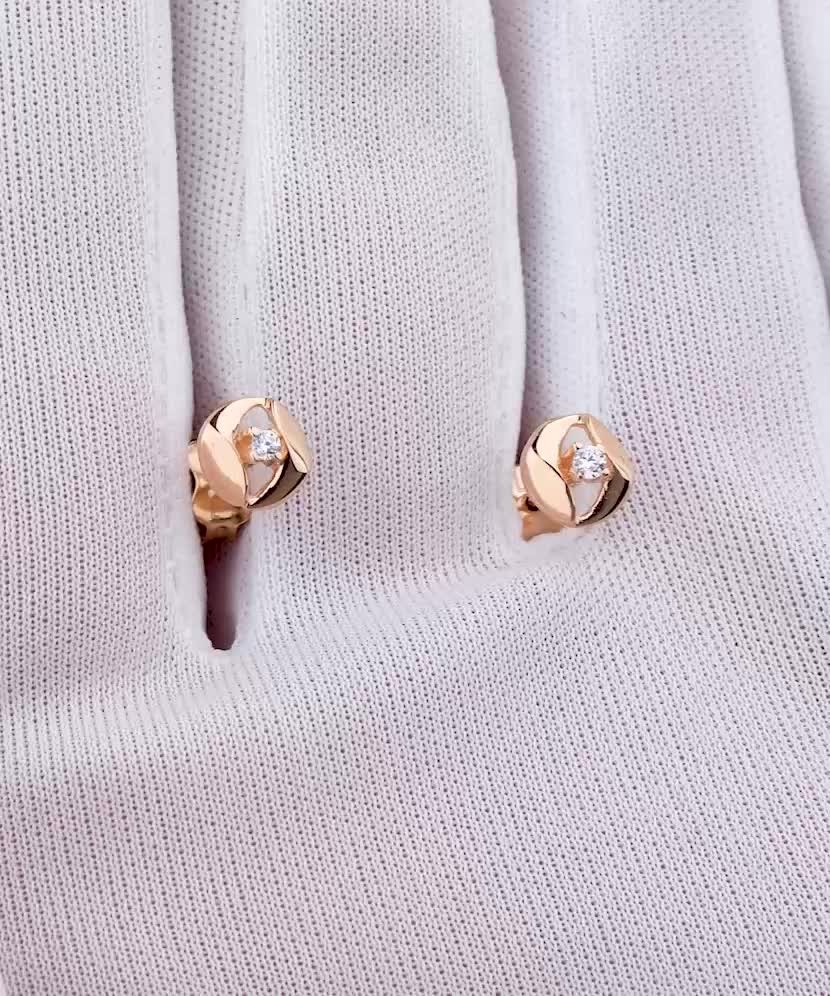 Gold earrings with zircons