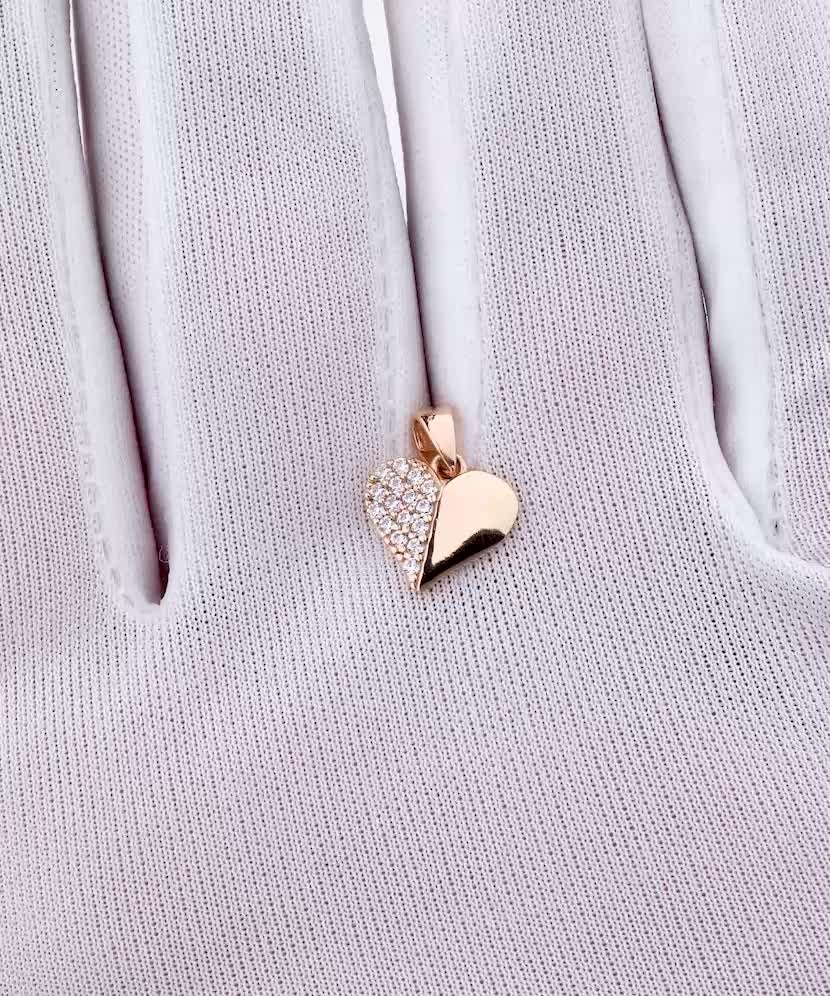 Gold pendant with zircons "heart"