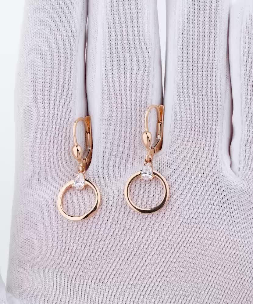 Gold earrings with zircons