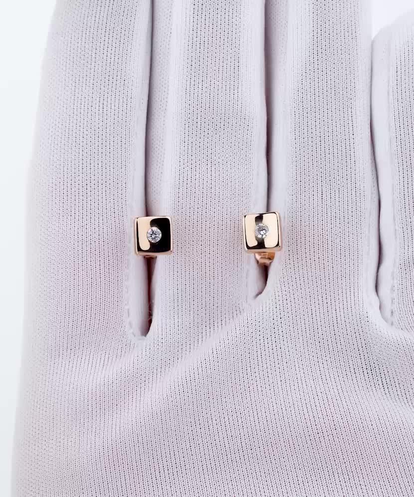 Gold earrings with zircons